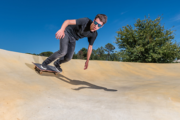 Image showing Skateboarder on a pump track park