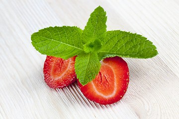 Image showing cut red ripe strawberry