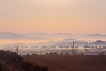 Image showing Autumn foggy sunrise landscape