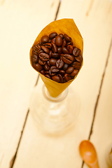 Image showing espresso coffee beans on a paper cone