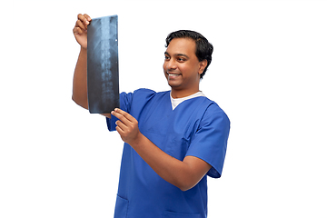 Image showing happy indian doctor or male nurse with x-ray