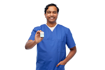 Image showing indian doctor or male nurse holding medicine