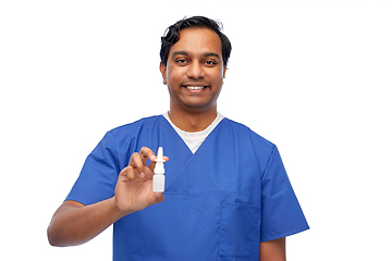 Image showing smiling indian male doctor or nurse with medicine