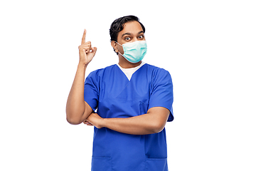 Image showing indian male doctor in blue uniform and mask