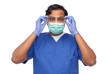 Image showing indian male doctor in blue uniform and mask