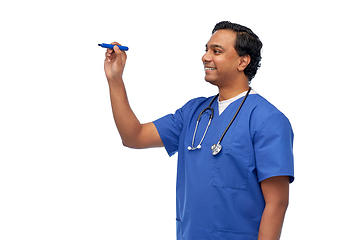 Image showing indian male doctor writing something with marker