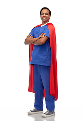 Image showing smiling doctor or male nurse in superhero cape