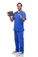 Image showing male doctor with tablet pc showing thumbs up