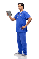 Image showing doctor or male nurse using tablet computer