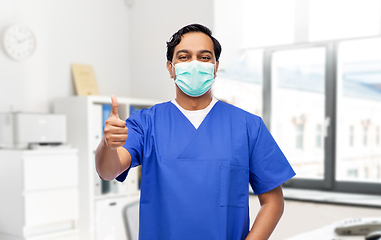 Image showing indian male doctor in mask showing thumbs up