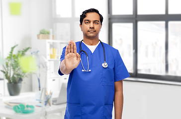 Image showing indian doctor or male nurse showing stop gesture