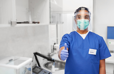 Image showing doctor in mask and face shield showing thumbs up