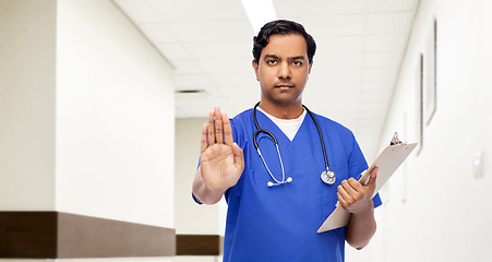 Image showing indian doctor or male nurse showing stop gesture