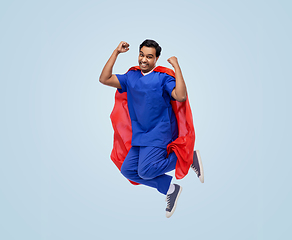 Image showing doctor or male nurse in superhero cape jumping