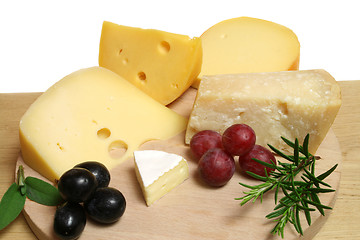 Image showing Cheeses and grapes