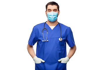 Image showing male doctor in blue uniform, mask and gloves