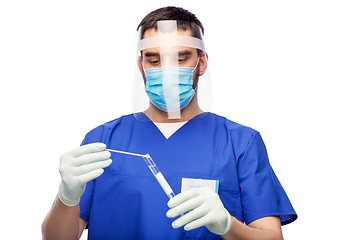 Image showing male doctor in mask with cotton swab and test tube