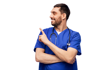 Image showing smiling doctor or male nurse with stethoscope