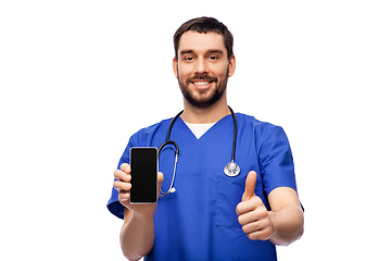 Image showing doctor or male nurse with phone showing thumbs up