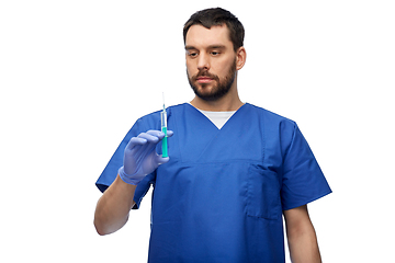 Image showing doctor or male nurse with medicine in syringe