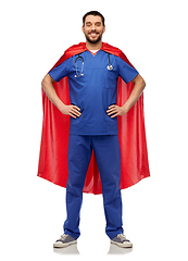 Image showing smiling doctor or male nurse in superhero cape