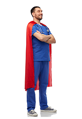 Image showing smiling doctor or male nurse in superhero cape