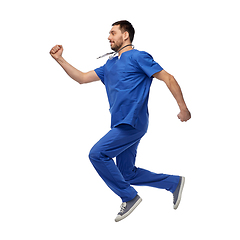 Image showing happy smiling doctor or male nurse jumping in air