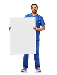 Image showing smiling male doctor or nurse with big white board