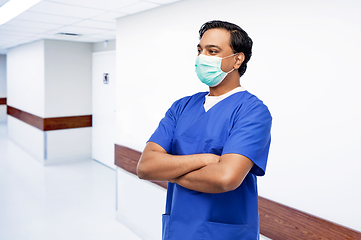 Image showing indian male doctor in blue uniform and mask