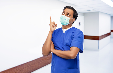 Image showing indian male doctor in blue uniform and mask