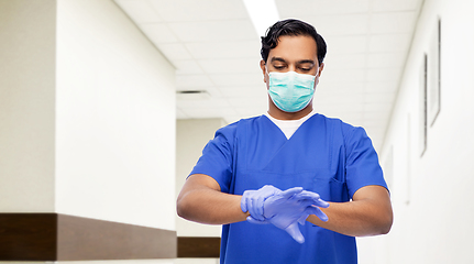 Image showing indian male doctor in uniform, mask and gloves