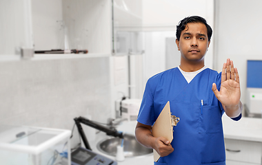 Image showing indian doctor or male nurse showing stop gesture