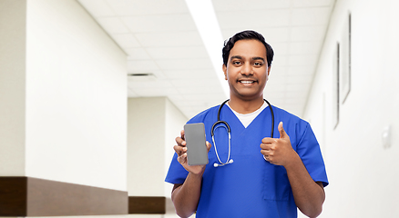 Image showing doctor or male nurse with phone showing thumbs up