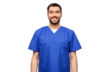 Image showing happy smiling doctor or male nurse in blue uniform