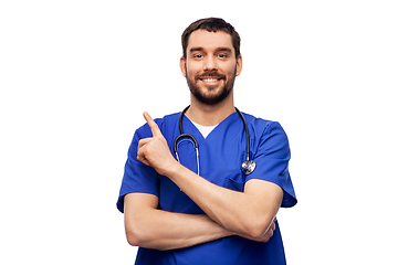 Image showing smiling doctor or male nurse with stethoscope