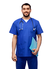 Image showing smiling doctor or male nurse with folder