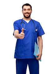 Image showing doctor or male nurse with folder showing thumbs up