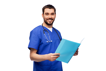 Image showing happy male doctor reading medical report in folder