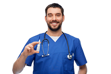 Image showing doctor or male nurse with medicine and stethoscope