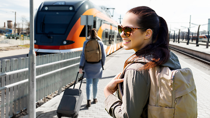 Image showing woman with backpack traveling by train in estonia