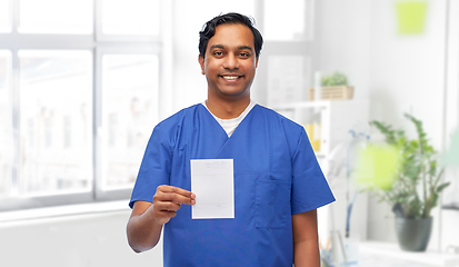 Image showing indian doctor or male nurse with prescription