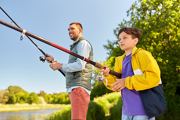 Image showing father and son fishing on river