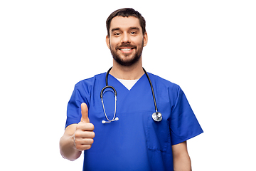 Image showing smiling doctor or male nurse showing thumbs up