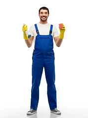 Image showing male cleaner cleaning with sponge and detergent