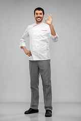 Image showing happy smiling male chef showing ok hand sign