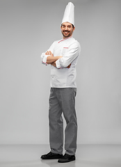 Image showing happy smiling male chef in toque