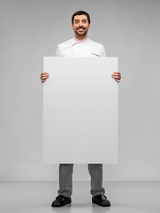 Image showing happy smiling male chef with big white board