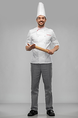 Image showing happy smiling male chef or baker with rolling pin