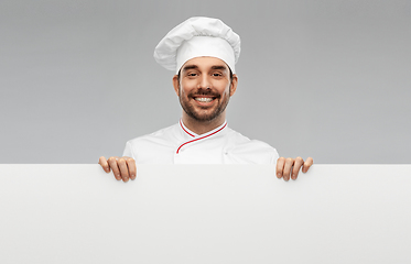 Image showing happy smiling male chef with big white board