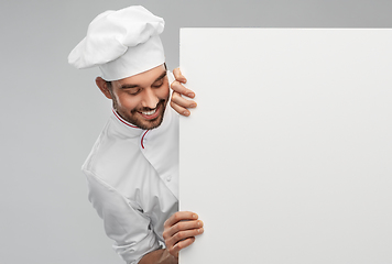 Image showing happy smiling male chef with big white board